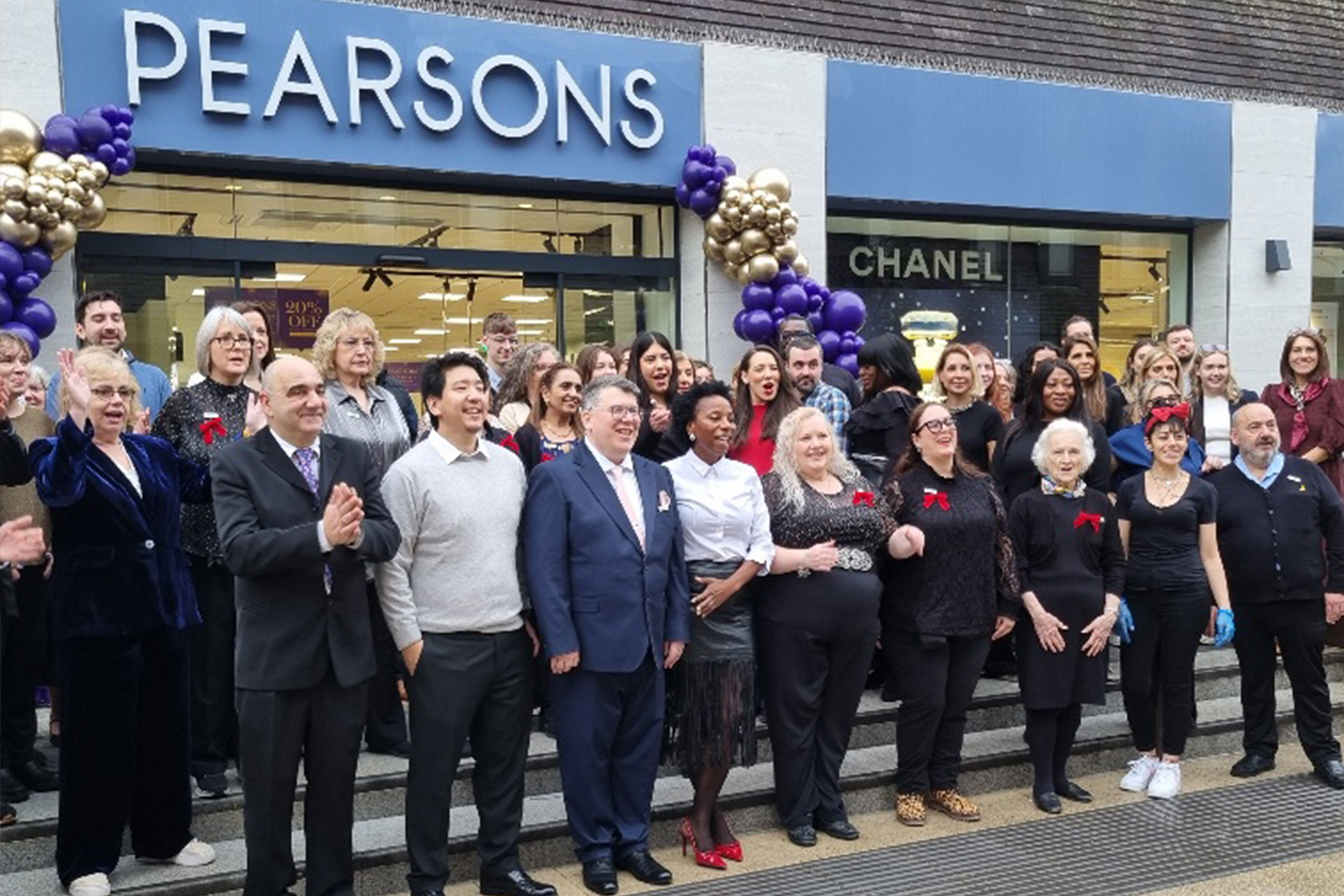 Staff and community members gathered outside Pearsons during the store’s reopening in November.